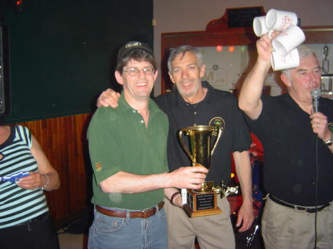 Peter accepting the trophy