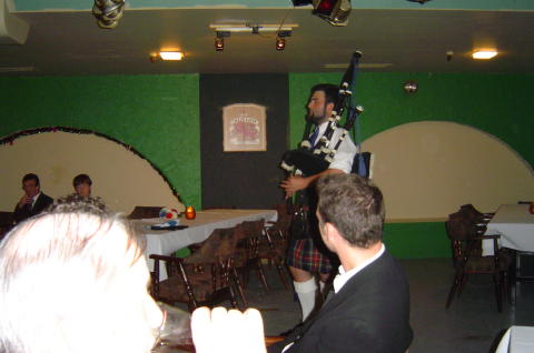 Brendan listening to the pipes